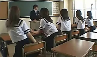 Asian School Grils Play In Classroom