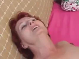 Beautiful red-haired granny