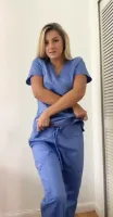 blonde nurse shows body